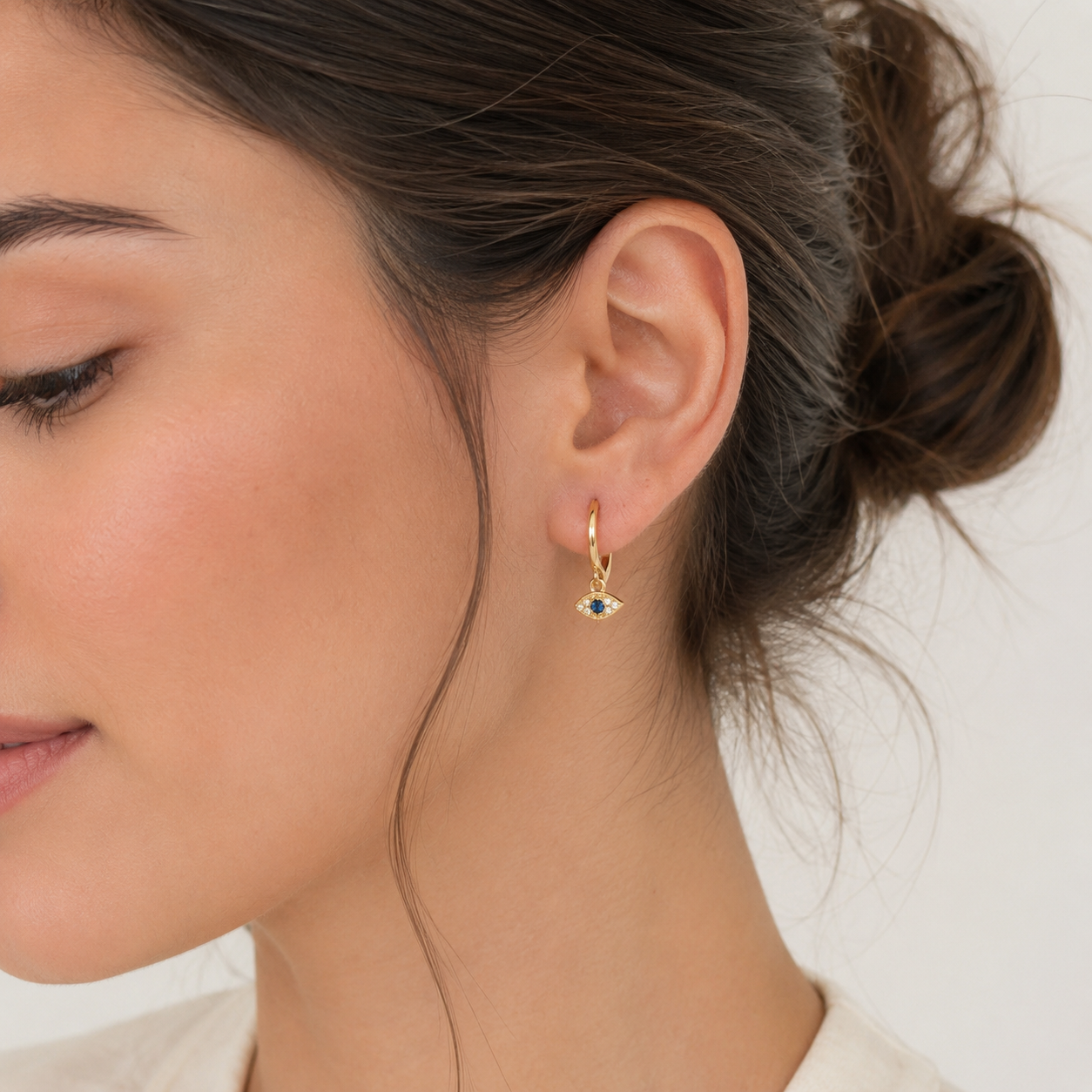 Pendientes Lira Eye bañados en oro 18k